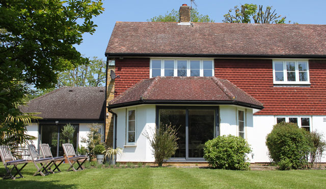 White Wood Effect upvc with Contemporary Aluminium Sliding Doors